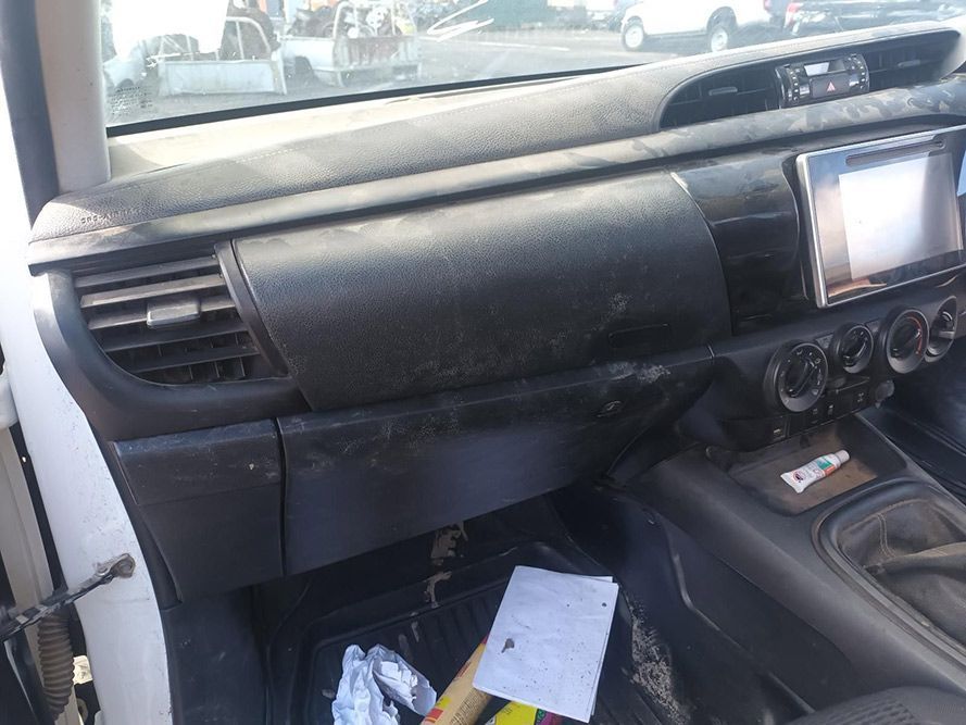 The Dashboard of a Car with a Broken Airbag and a Radio — South West 4WD Wreckers In Brisbane, QLD