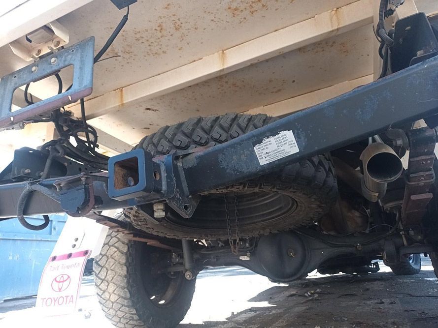 The Underside of a Toyota Truck with a Trailer Attached to It — South West 4WD Wreckers In Brisbane, QLD