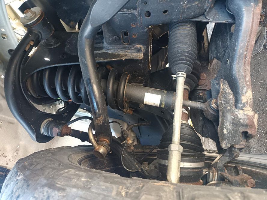 A Close Up of the Underside of a Car Showing the Suspension and Steering System — South West 4WD Wreckers In Brisbane, QLD