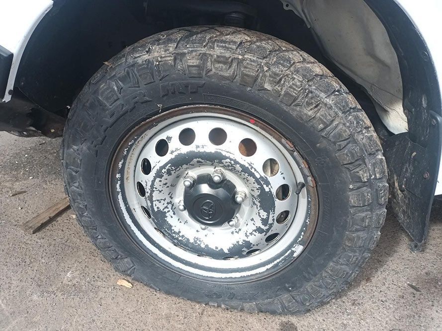 A Close Up of a Tire on a White Truck — South West 4WD Wreckers In Brisbane, QLD