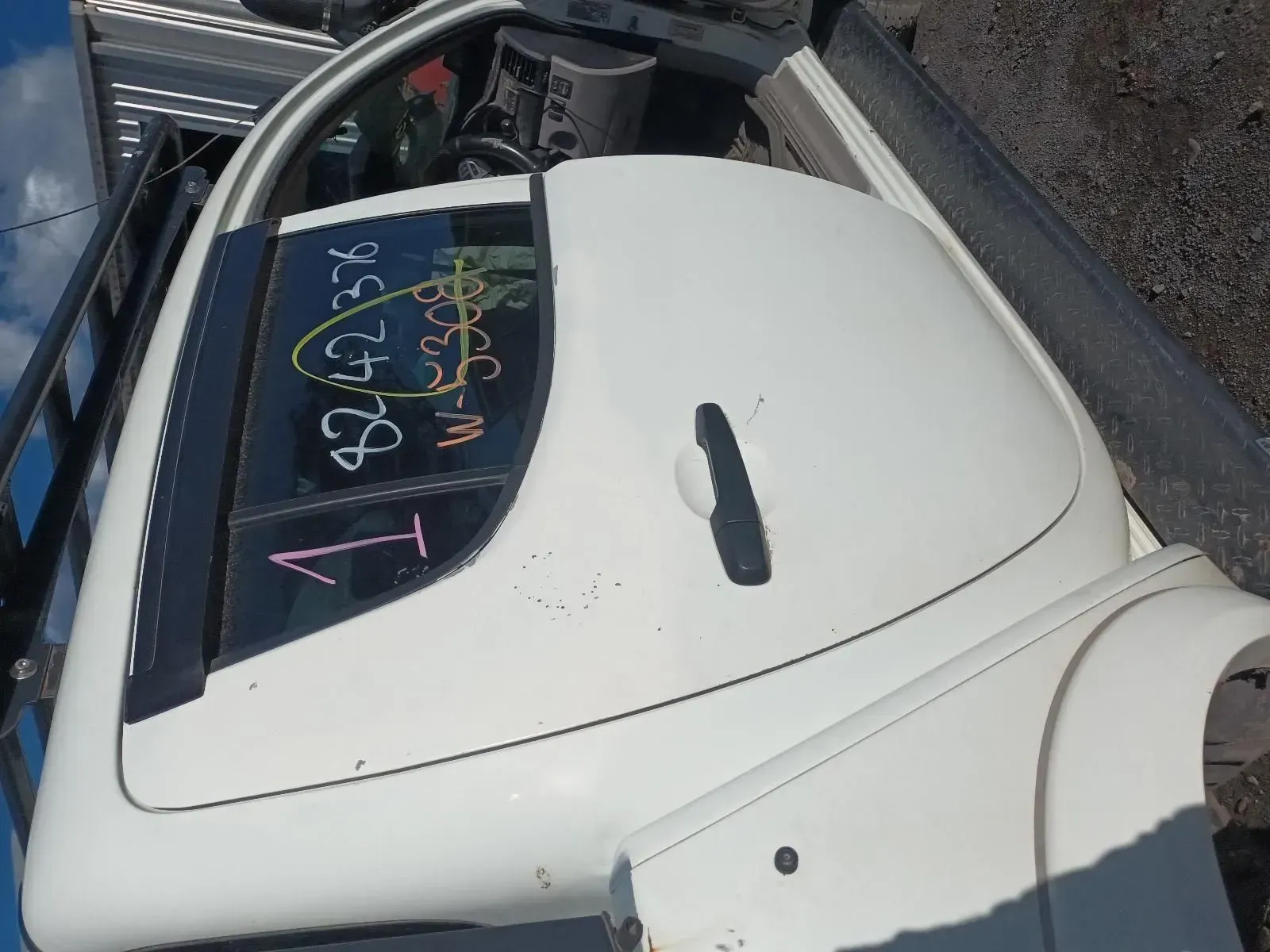 White Car Door With a Window and Door Handle, Marked With Handwritten Notes — South West 4WD Wreckers In Brisbane, QLD