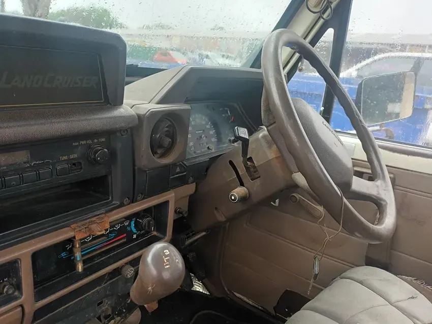 The Interior of a Car With a Steering Wheel and a Radio — South West 4WD Wreckers In Brisbane, QLD