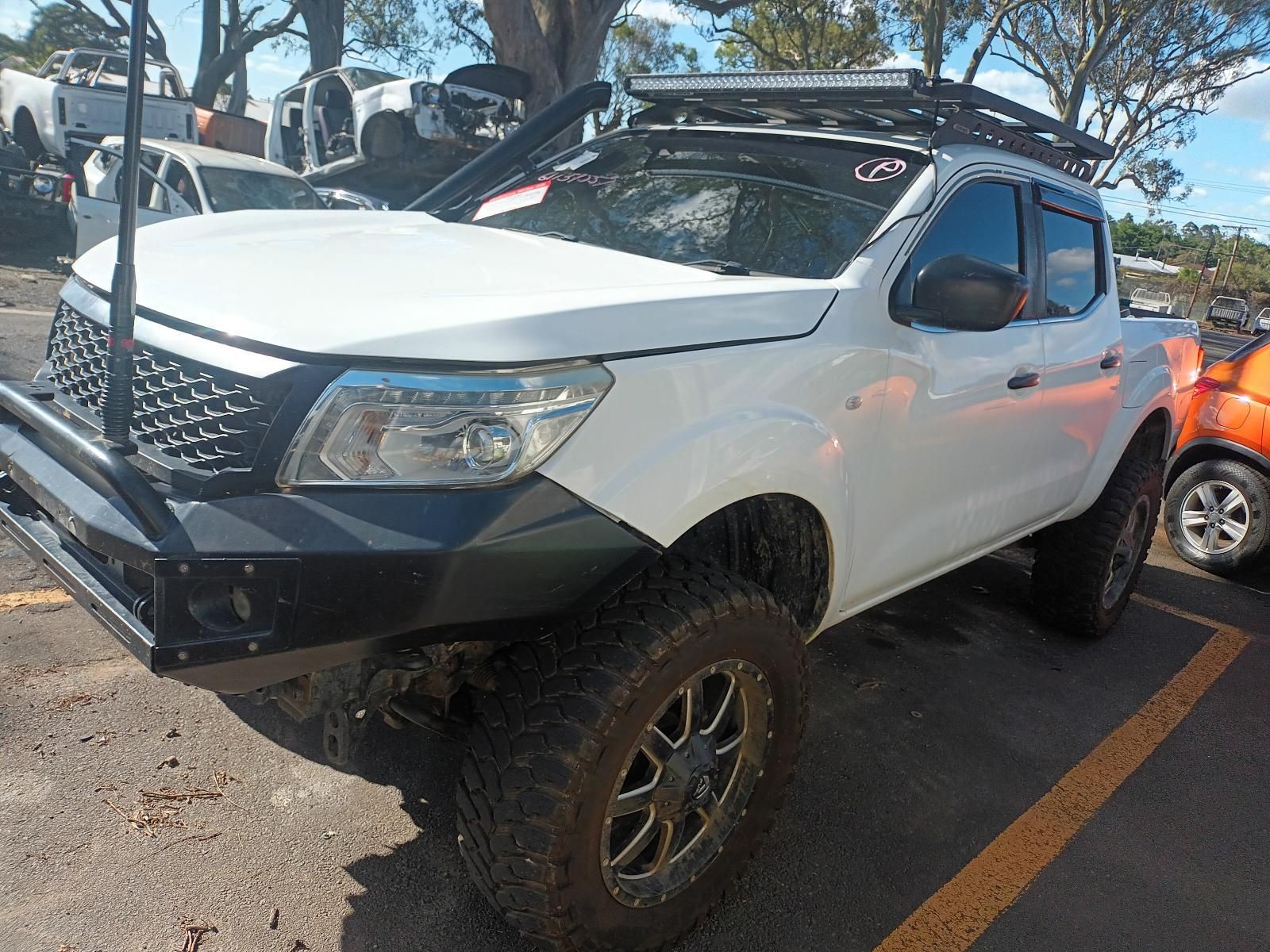 A Blue Suv With a Snorkel is Parked in a Dirt Lot — South West 4WD Wreckers In Brisbane, QLD