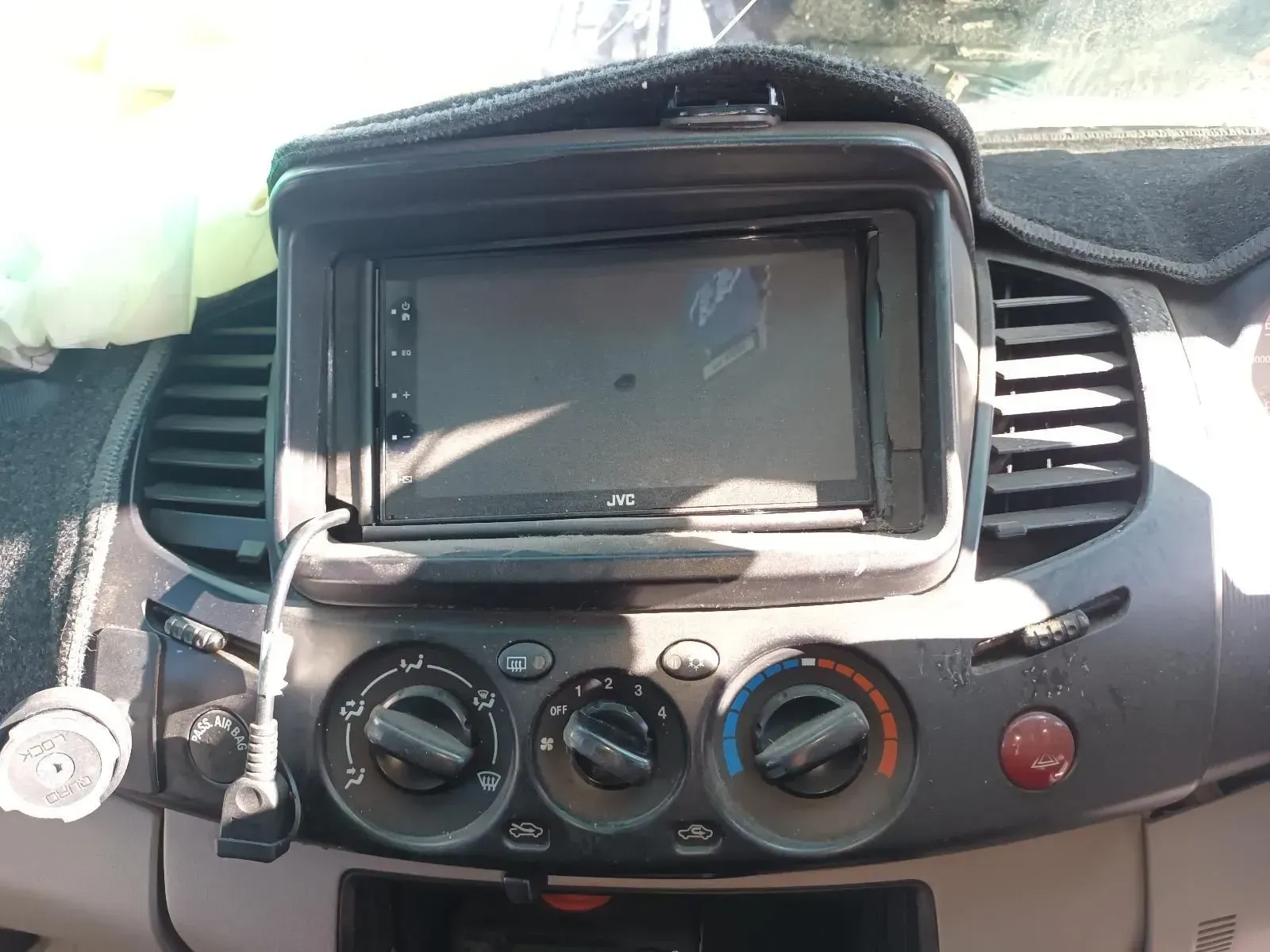 Car Dashboard With Aftermarket Touchscreen Radio, Climate Controls — South West 4WD Wreckers In Brisbane, QLD