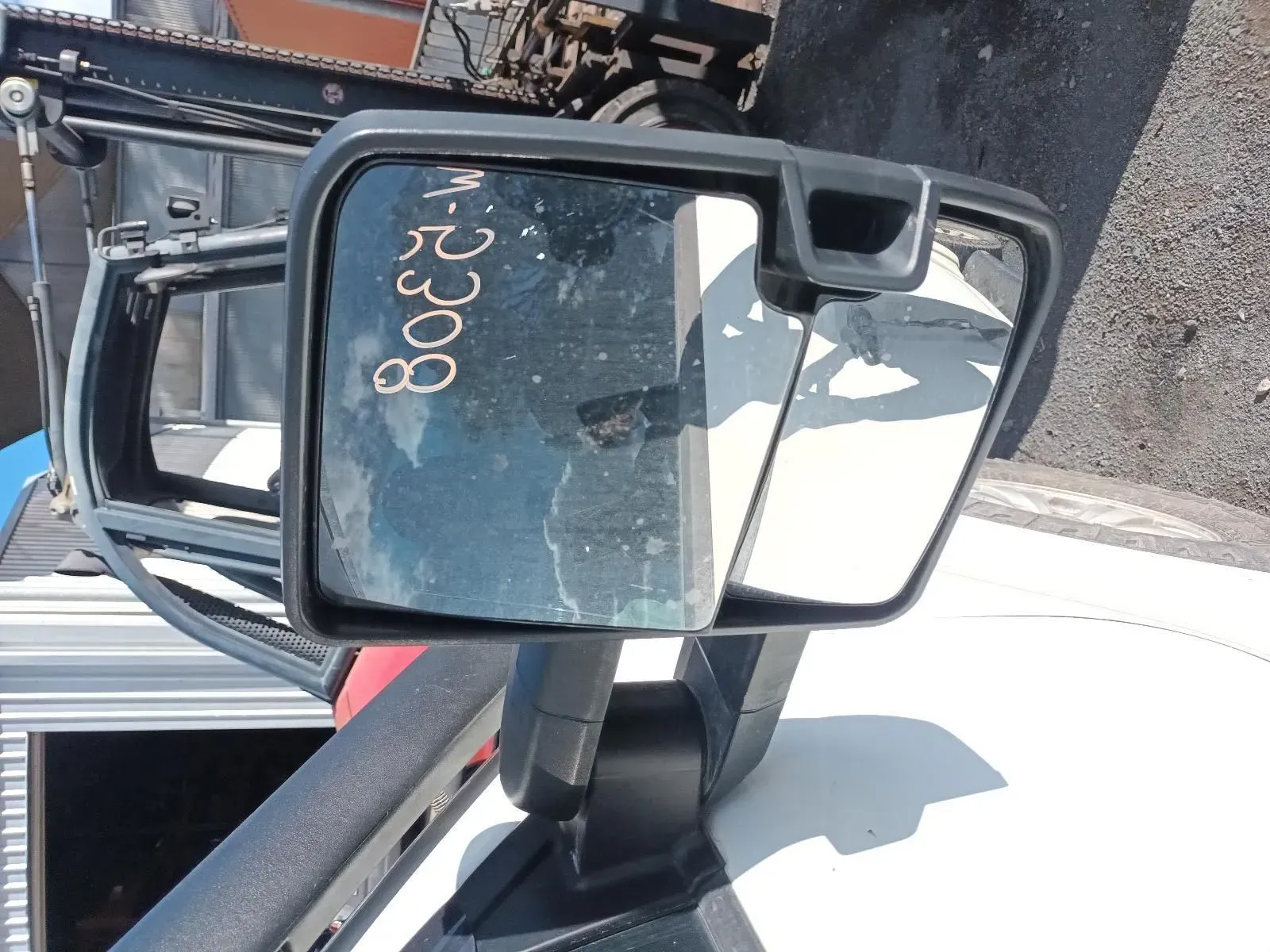 Side View Mirror on a White Vehicle With Dirty Glass — South West 4WD Wreckers In Brisbane, QLD