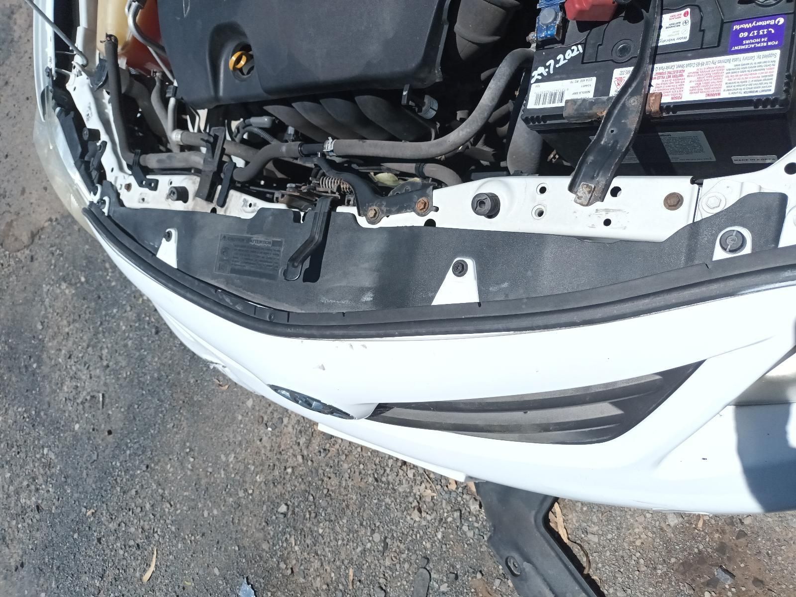 Front of A White Car with The Hood Open, Showing the Engine Bay — South West 4WD Wreckers In Harristown, QLD