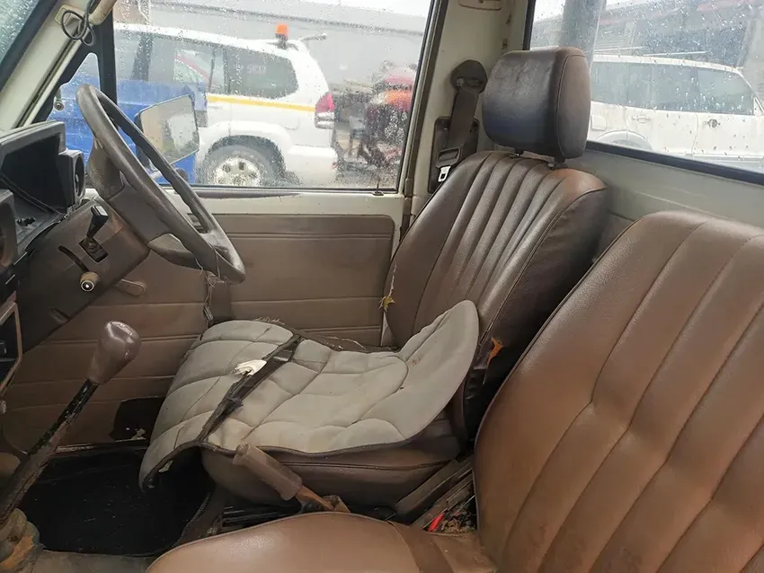 The Inside of a Truck With a Broken Seat and a Steering Wheel — South West 4WD Wreckers In Brisbane, QLD
