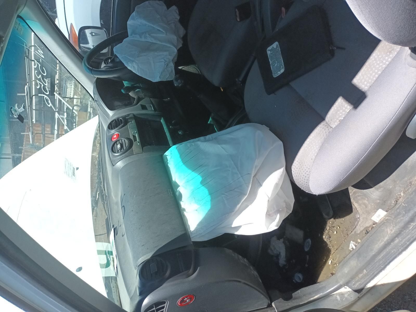 Two Seats in A Car with White Protective Covers — South West 4WD Wreckers In Harristown, QLD