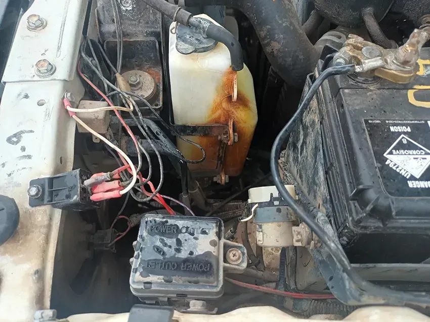 A Close Up of a Car Engine With a Battery and a Water Tank — South West 4WD Wreckers In Brisbane, QLD