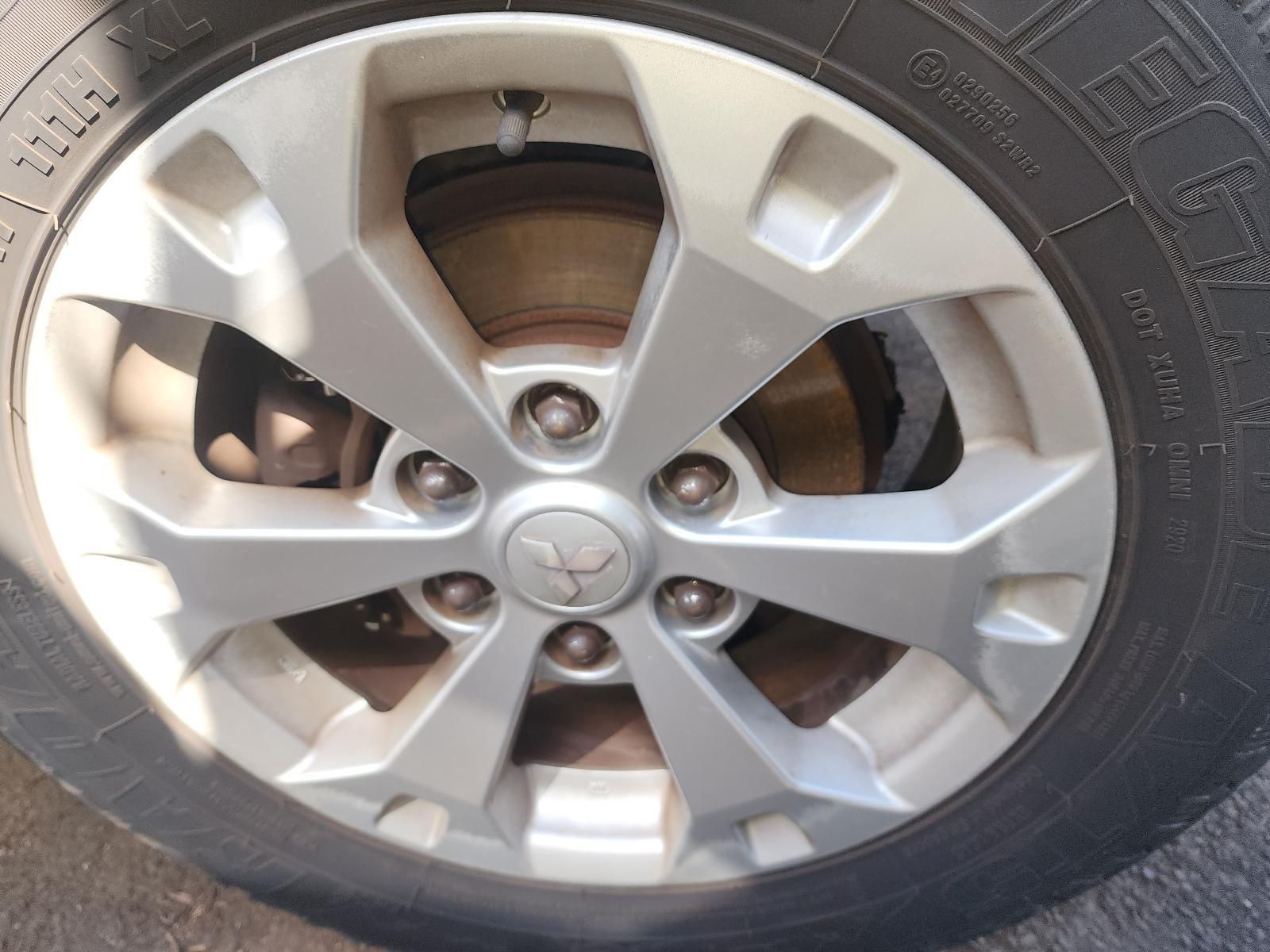 Close-up of a Car Tyre and Silver Alloy Wheel — South West 4WD Wreckers In Harristown, QLD