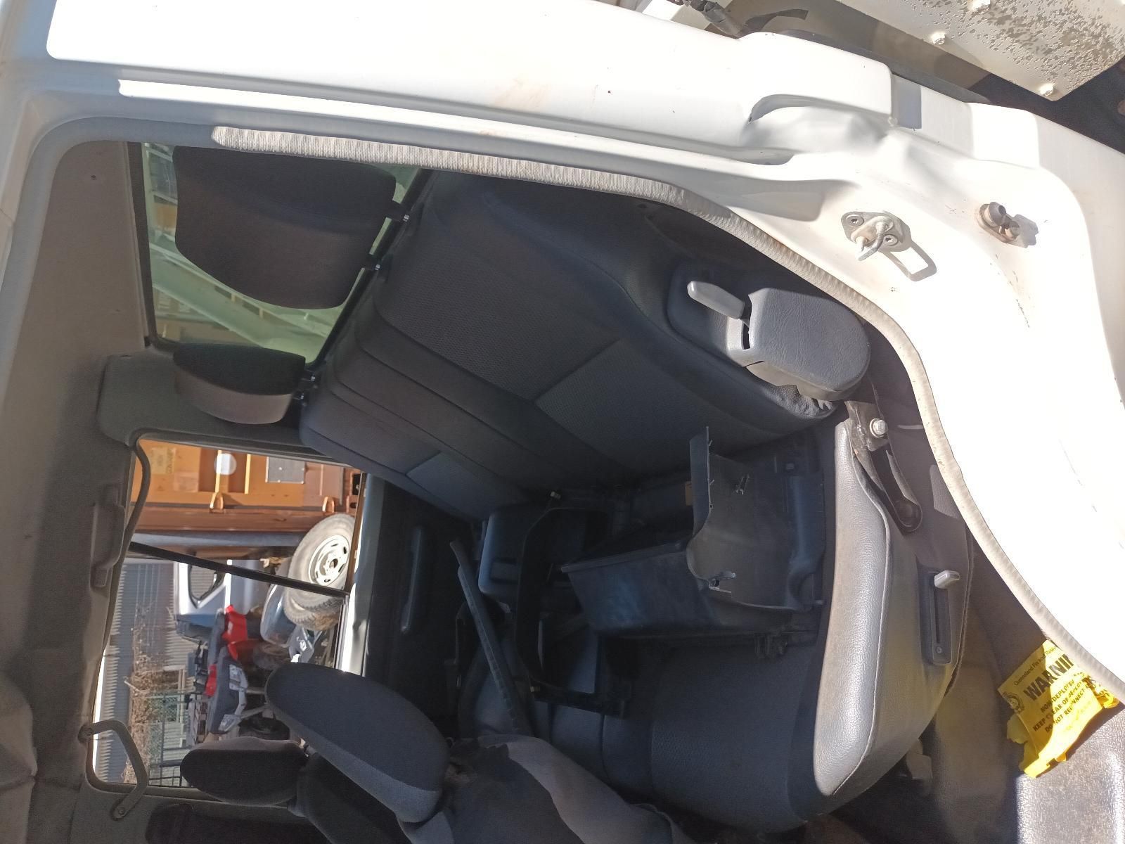 Overturned White Vehicle Interior with Black Seats — South West 4WD Wreckers In Harristown, QLD