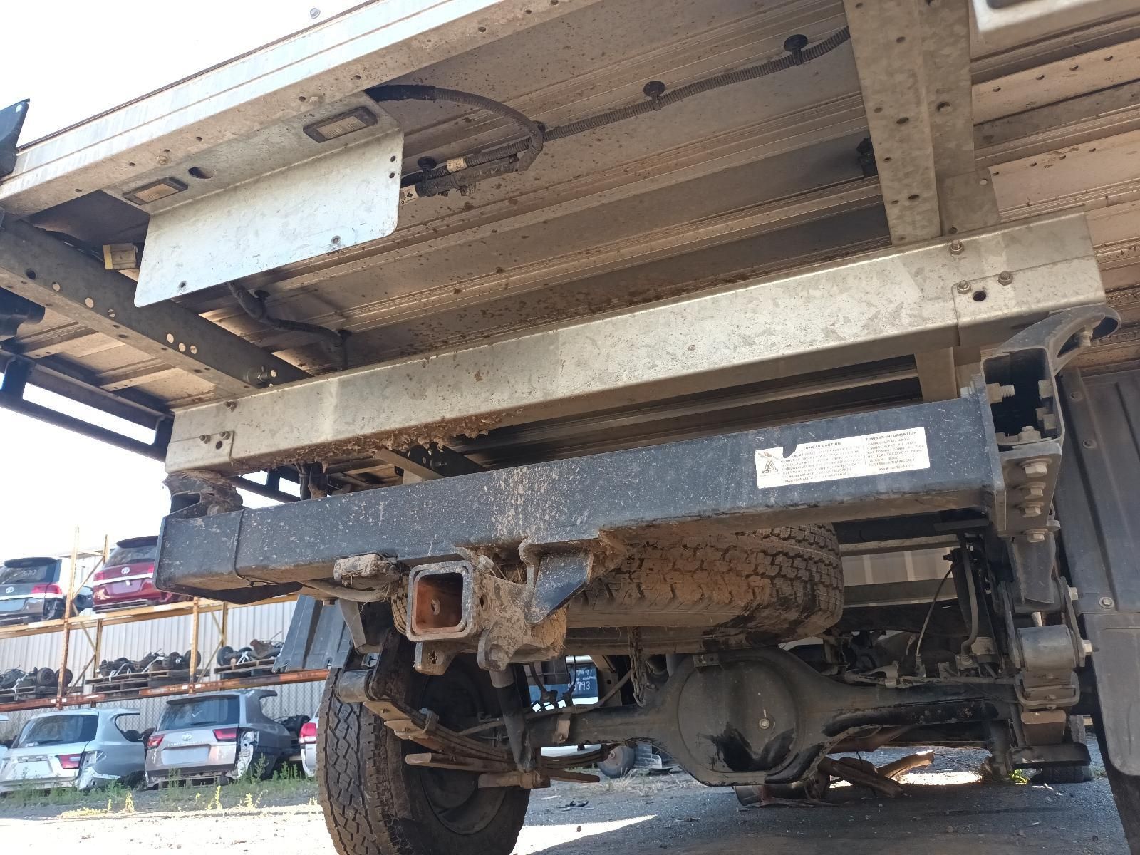 Underside of a Damaged Flatbed Truck With Rusted Frame — South West 4WD Wreckers In Harristown, QLD