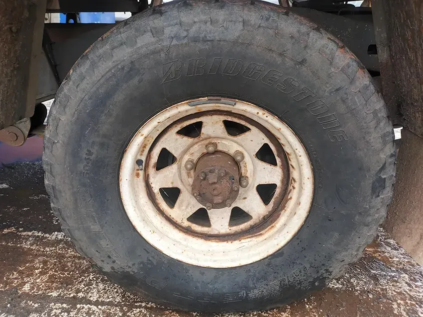 A Close Up of a Tire on a Truck With a White Rim — South West 4WD Wreckers In Brisbane, QLD