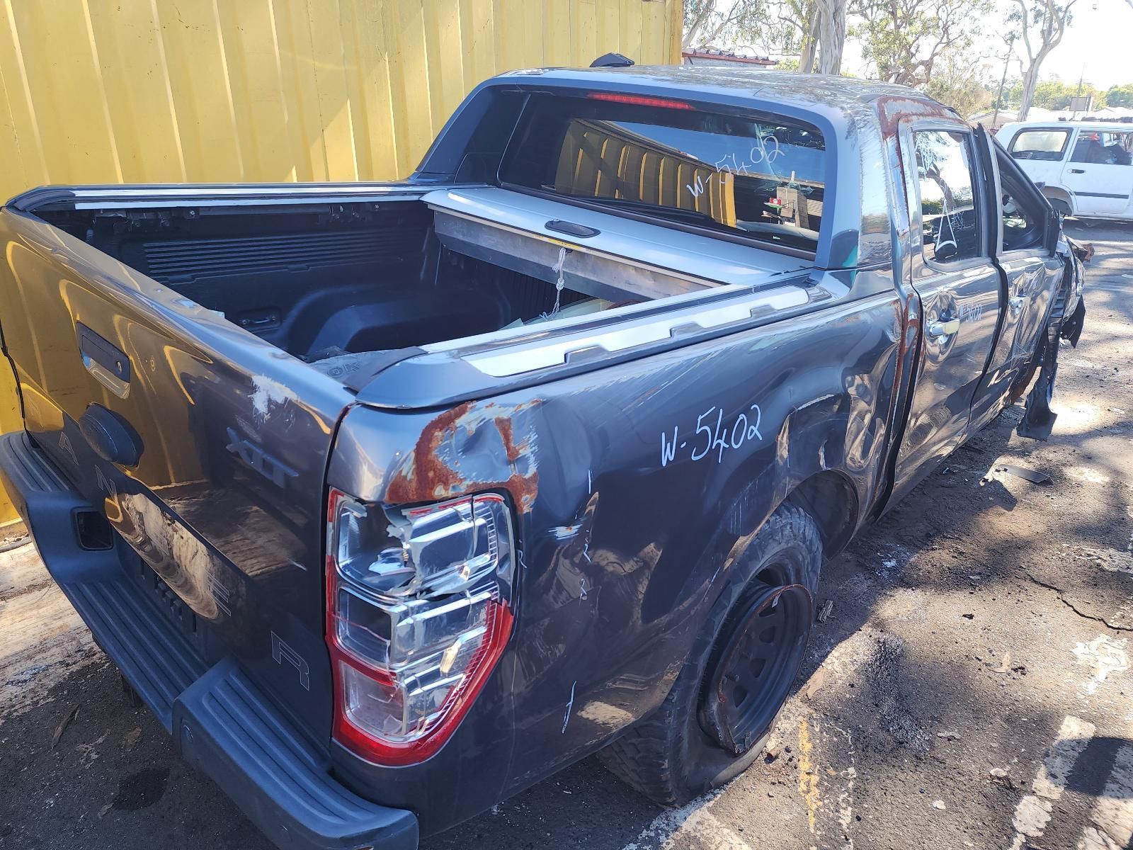 Damaged Dark Blue Pickup Truck — South West 4WD Wreckers In Harristown, QLD