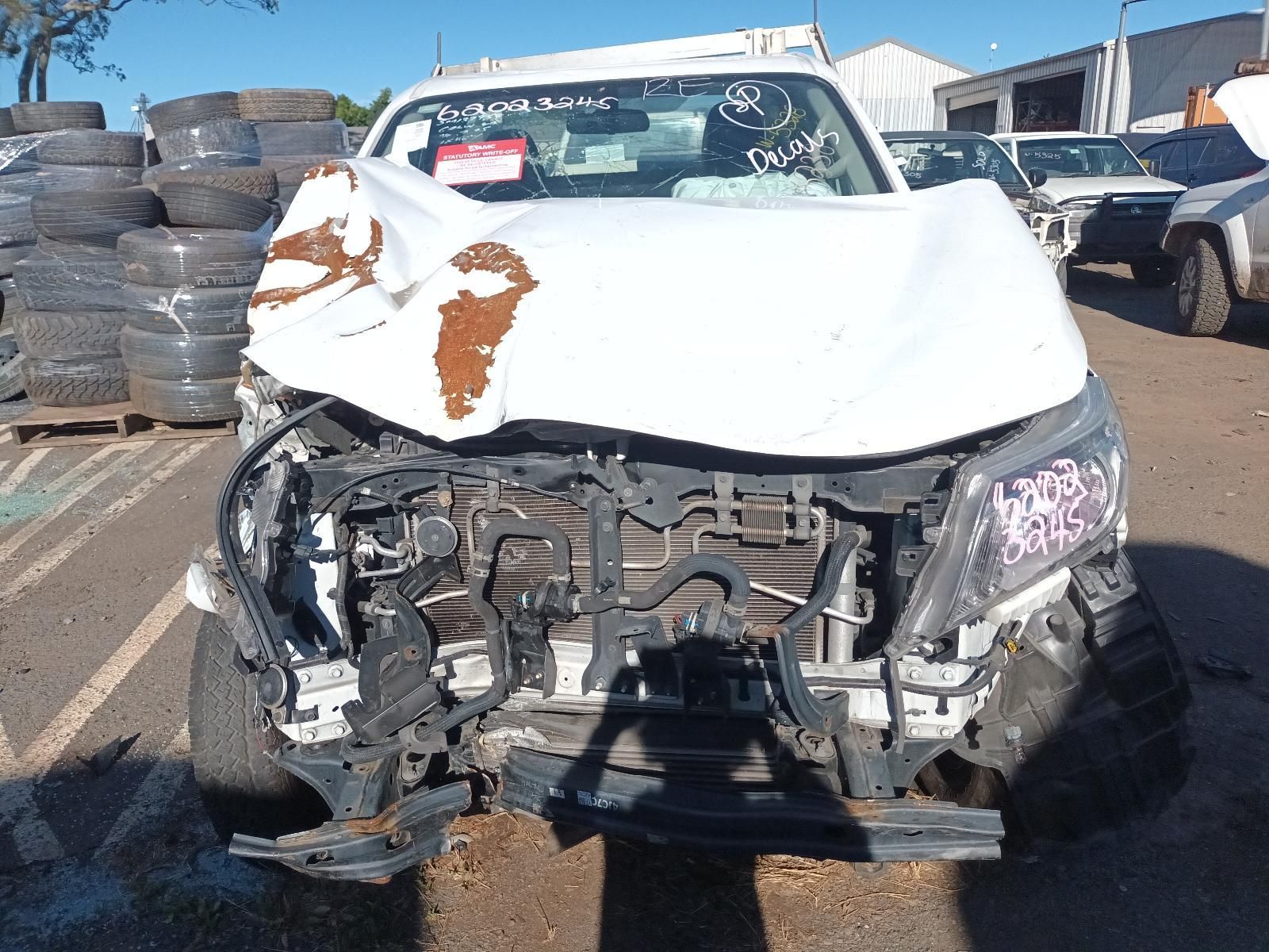 Damaged White Car With a Crushed Front End — South West 4WD Wreckers In Harristown, QLD
