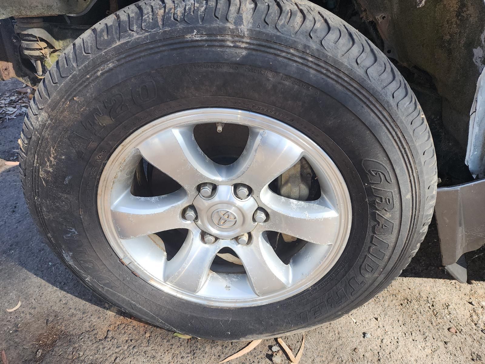 Close-up of a Silver Car Wheel — South West 4WD Wreckers In Harristown, QLD