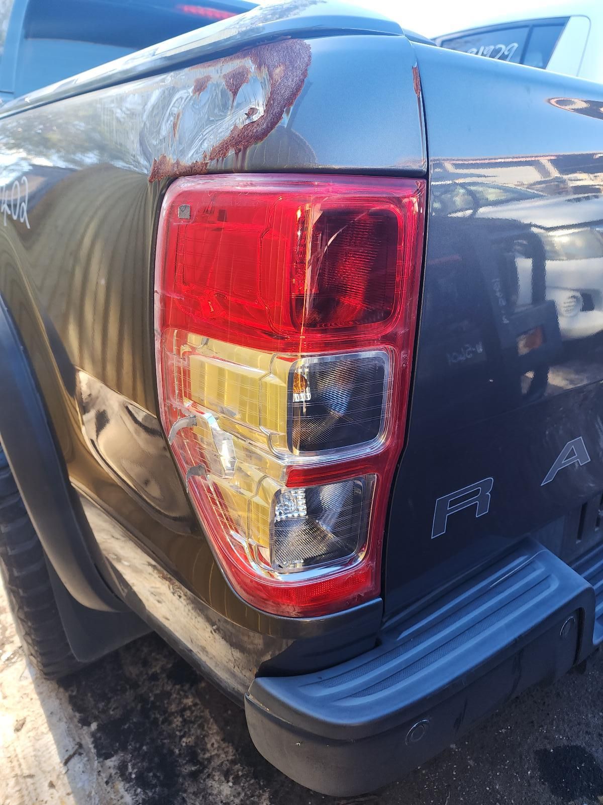 Rear Corner of a Dark Pickup Truck — South West 4WD Wreckers In Harristown, QLD