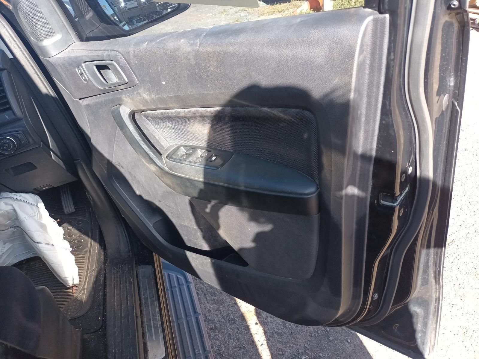 Open Car Door with Black Interior Panel and Storage Pocket — South West 4WD Wreckers In Harristown, QLD