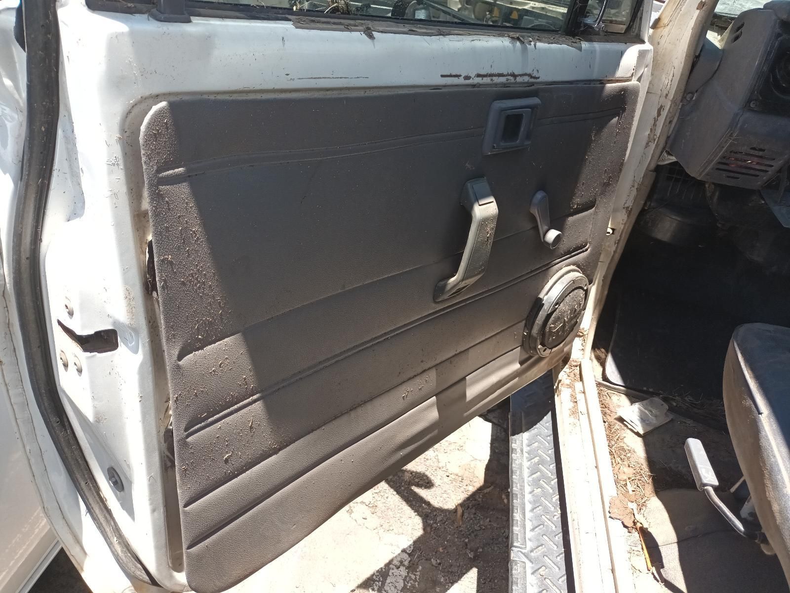 Close-Up of A Car’s Dark Grey Interior Door Panel with Handle — South West 4WD Wreckers In Harristown, QLD