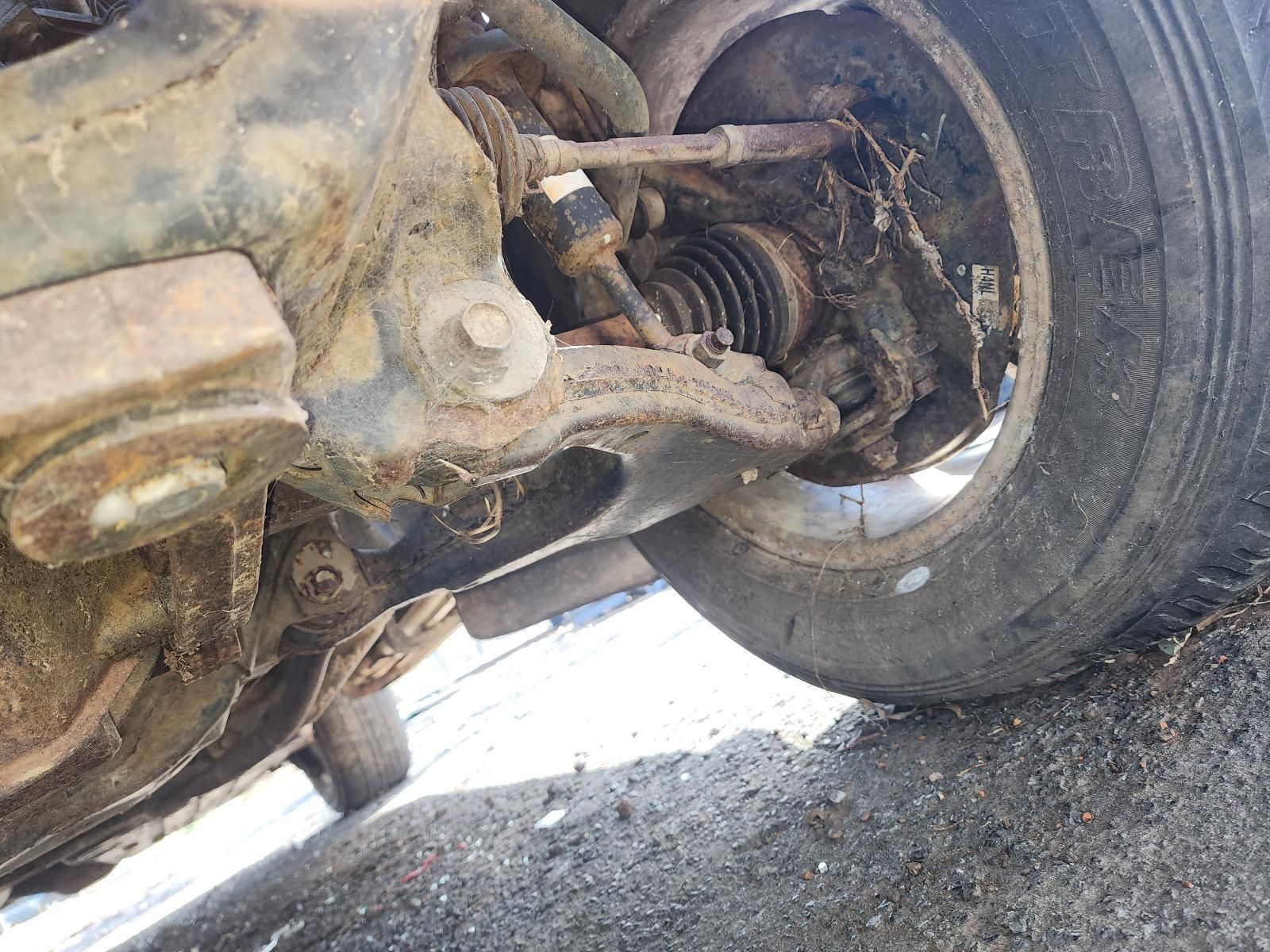 Close-up of a Car’s Damaged Wheel — South West 4WD Wreckers In Harristown, QLD
