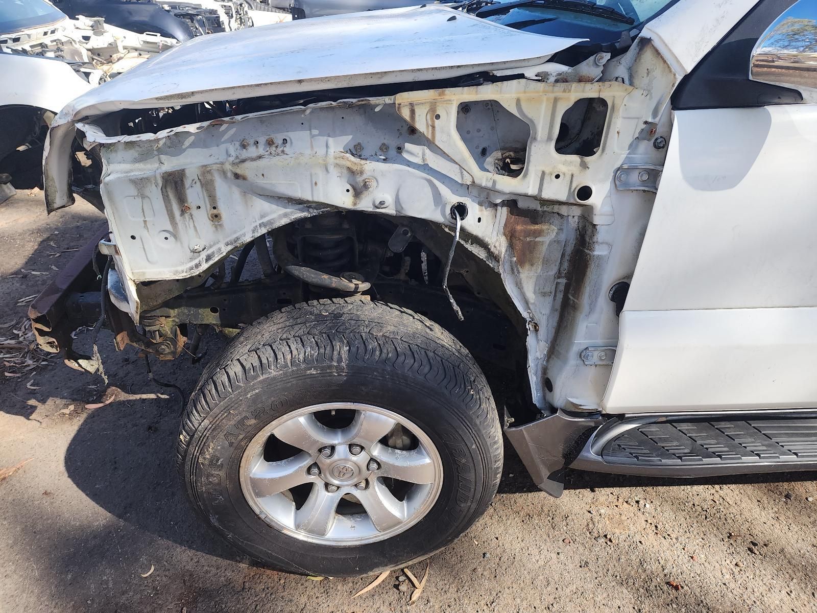 Damaged White SUV — South West 4WD Wreckers In Harristown, QLD