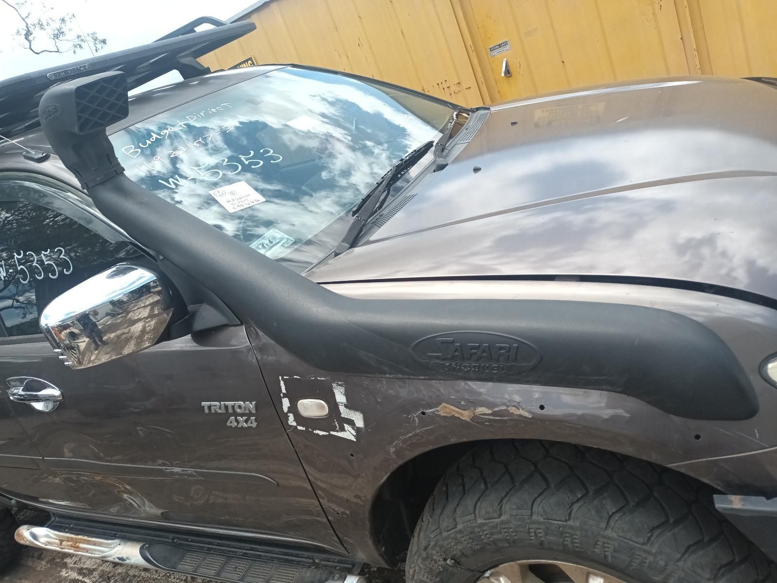 Close-Up of A Muddy Brown Pickup Truck with A Black Snorkel — South West 4WD Wreckers In Harristown, QLD