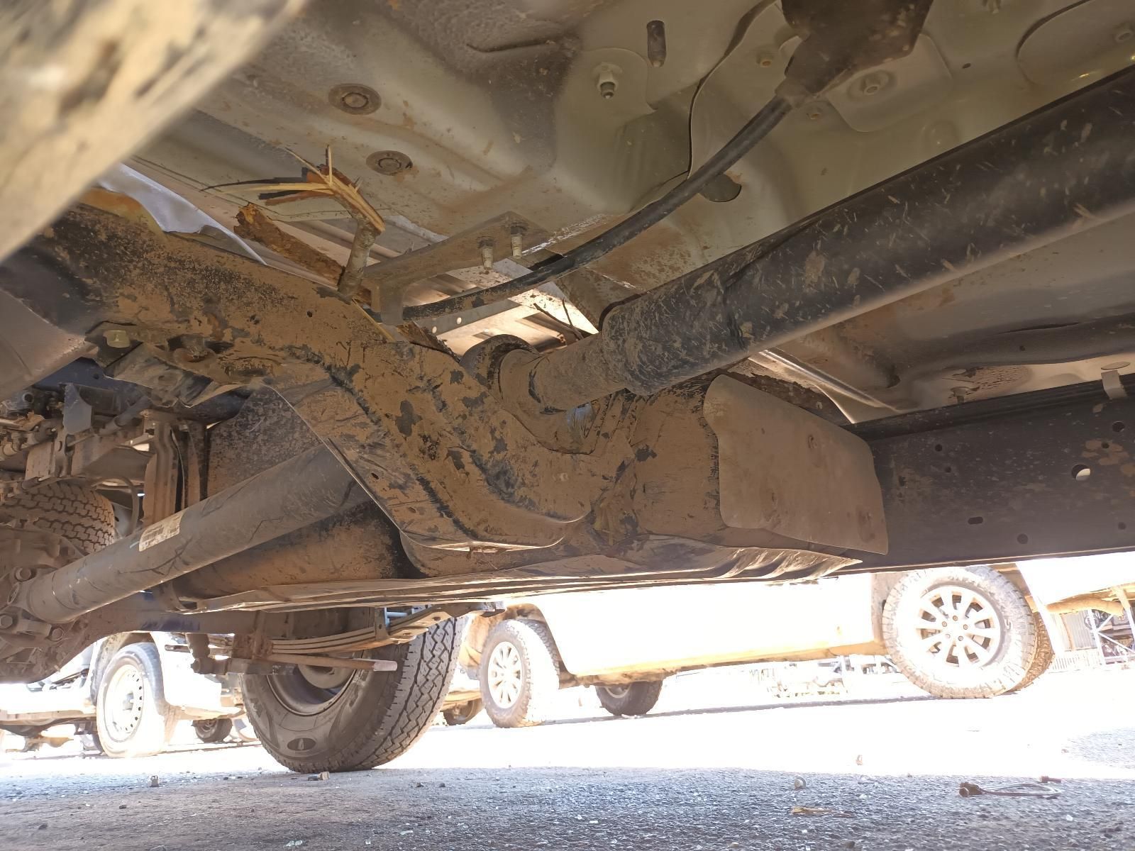 Undercarriage of a Muddy Vehicle With Rusted Frame — South West 4WD Wreckers In Harristown, QLD