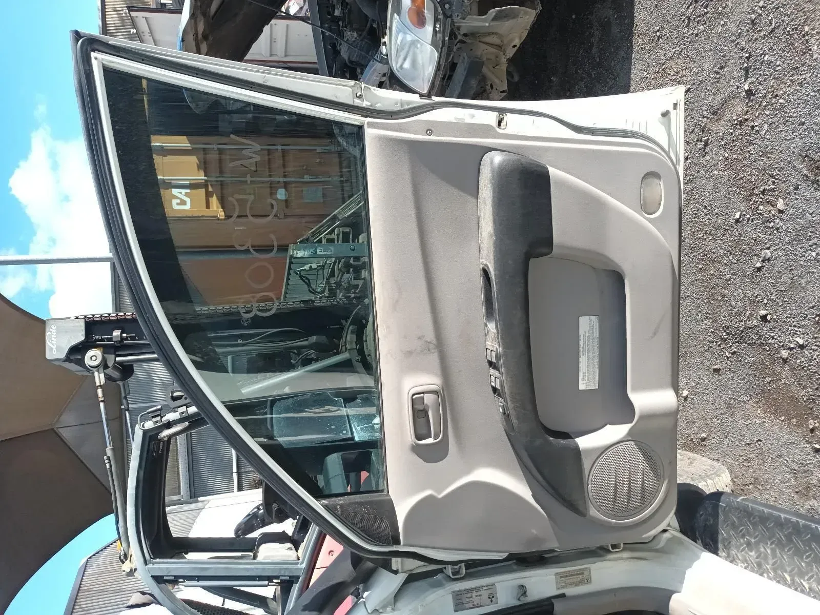 White Car Door Open, Showing Interior Panel With Window Controls and Handle — South West 4WD Wreckers In Brisbane, QLD