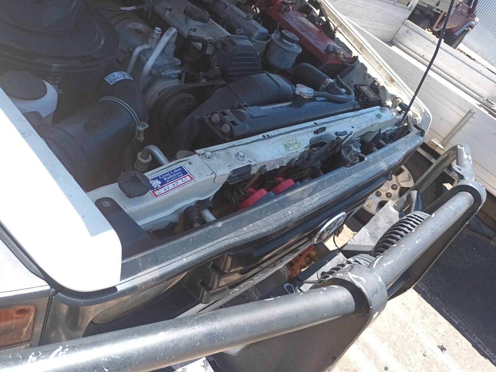 Open Truck Engine Bay with Hoses, Metal Components — South West 4WD Wreckers In Harristown, QLD