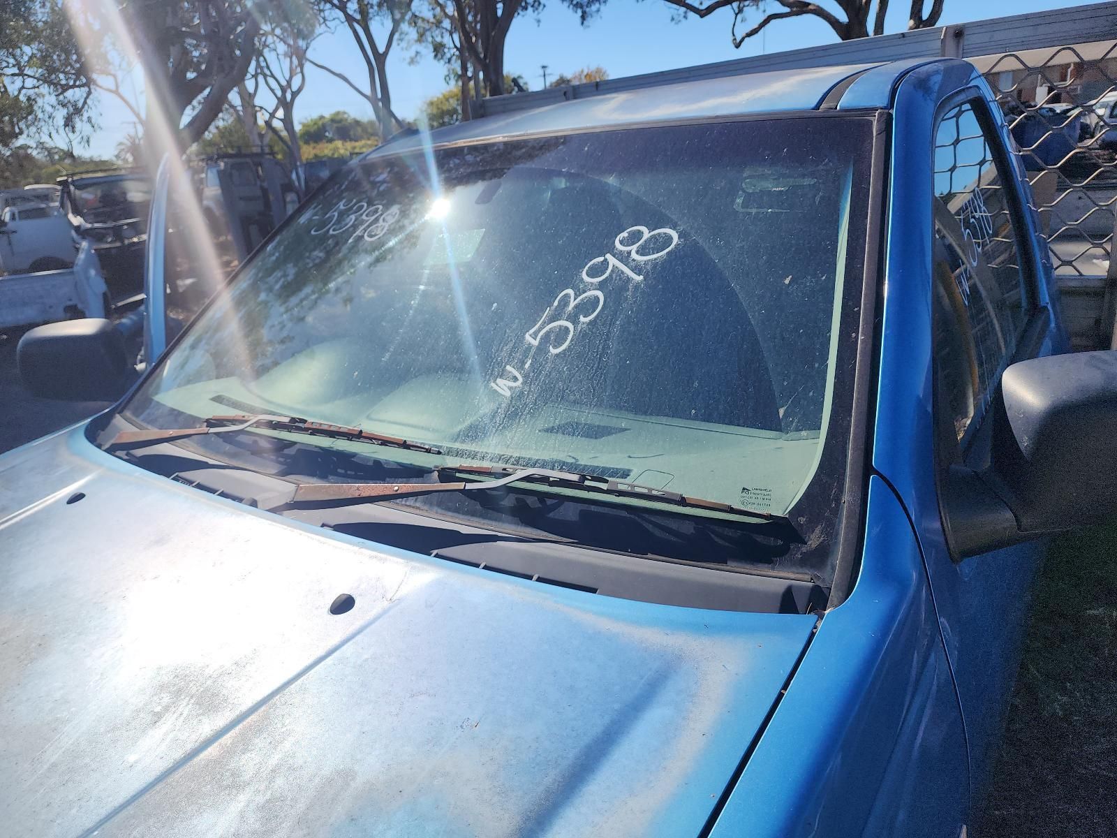 Blue Car With Windshield Damage — South West 4WD Wreckers In Harristown, QLD