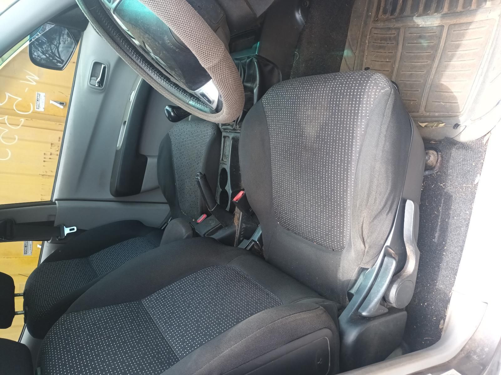 Car Interior with Black Front Seats and A Steering Wheel — South West 4WD Wreckers In Harristown, QLD