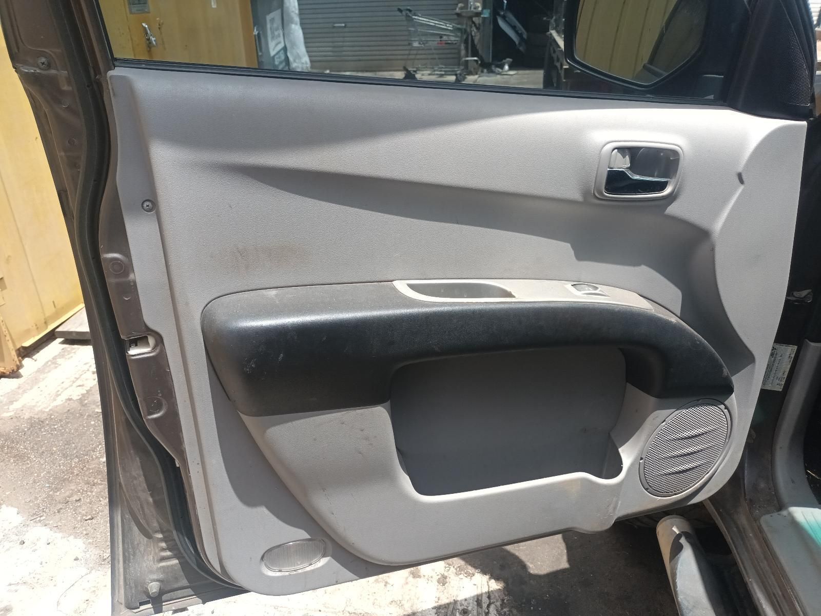 Gray Car Interior Door Panel with Black Armrest — South West 4WD Wreckers In Harristown, QLD