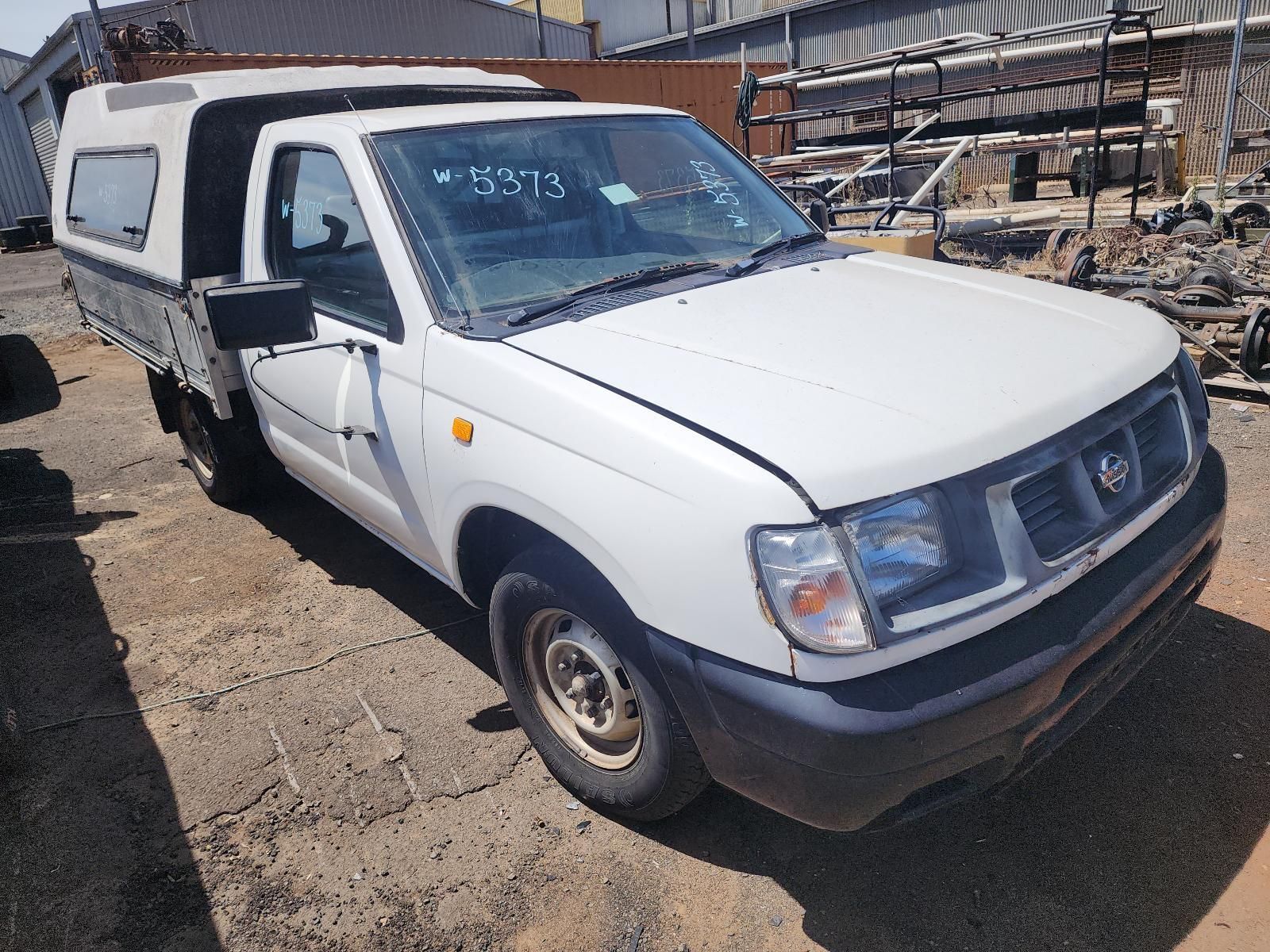 White Pickup Truck With a Canopy Parked — South West 4WD Wreckers In Harristown, QLD