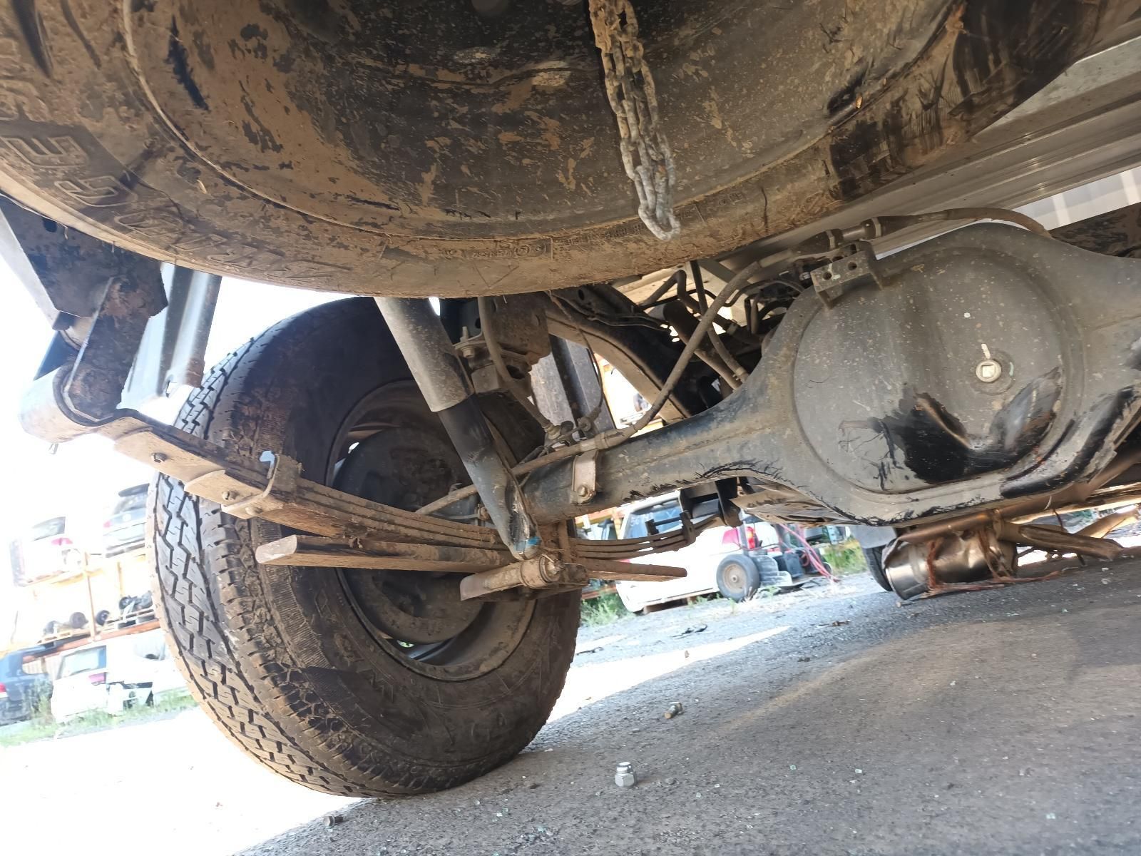 Undercarriage of a Muddy Off-road Truck — South West 4WD Wreckers In Harristown, QLD