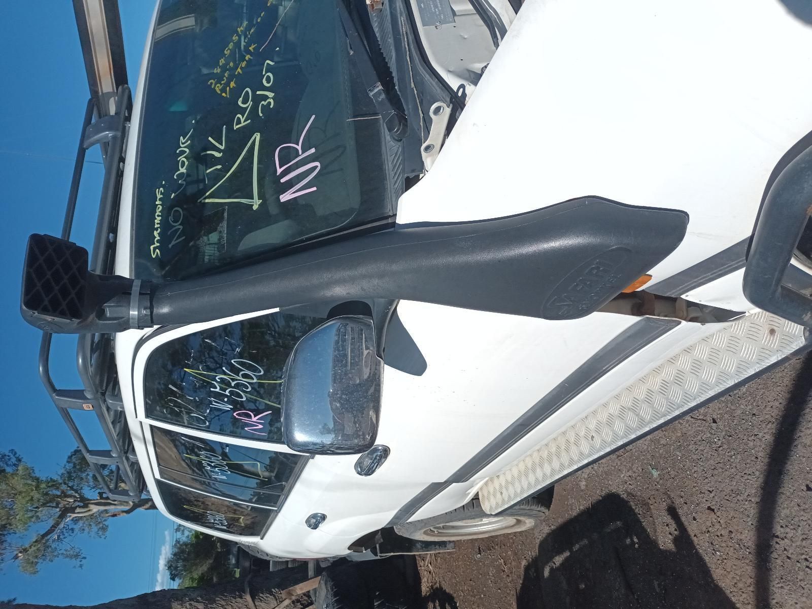 Damaged White Utility Truck with Broken Side Mirror Parked on A Roadside — South West 4WD Wreckers In Harristown, QLD
