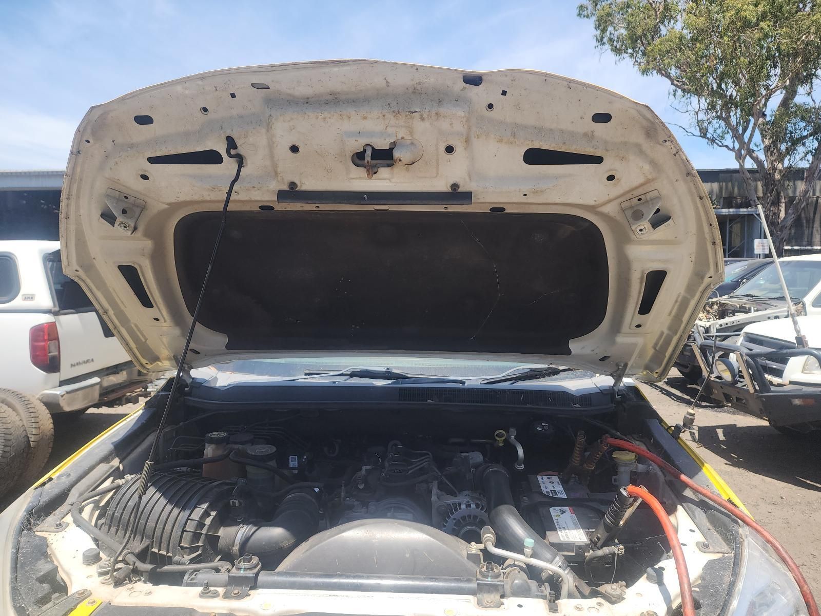 Open Car Hood Showing Engine Bay — South West 4WD Wreckers In Harristown, QLD
