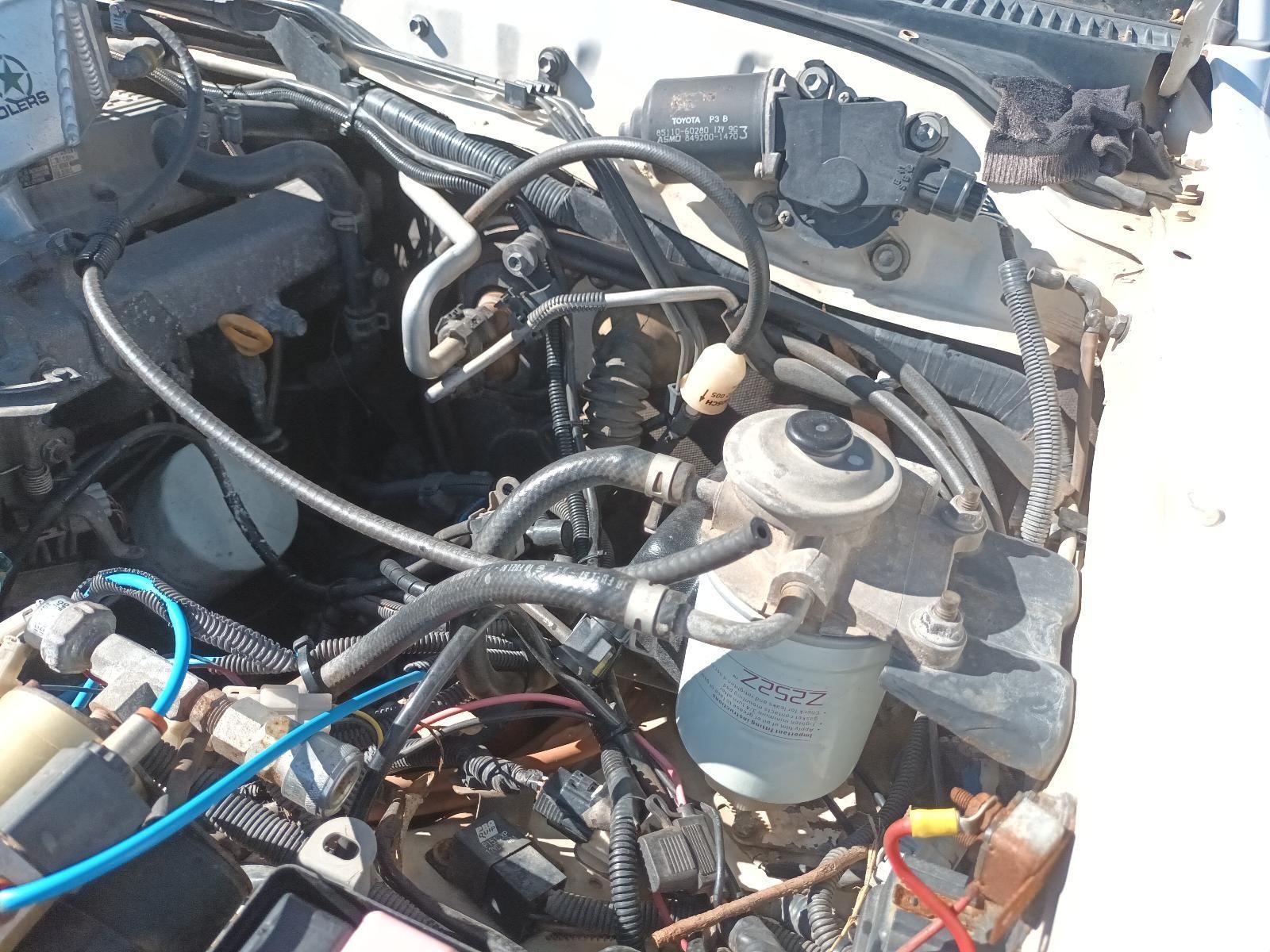 Close-Up of A Car Engine Bay with Hoses, Wiring — South West 4WD Wreckers In Harristown, QLD