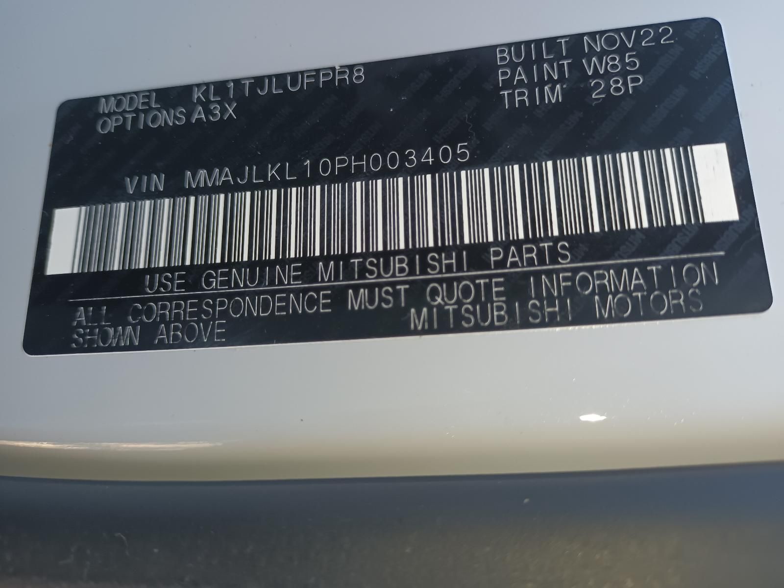 Close-Up of A Black Mitsubishi Vehicle Identification Plate — South West 4WD Wreckers In Harristown, QLD