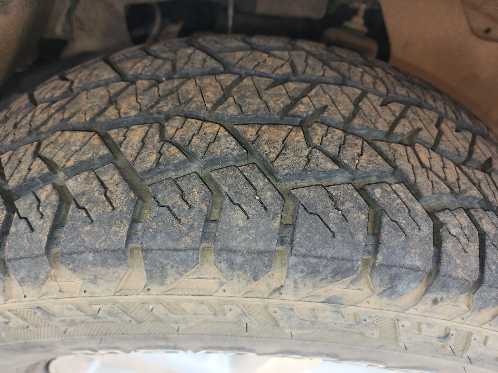 Close-up of a Worn Car Tire Tread With Dirt — South West 4WD Wreckers In Harristown, QLD