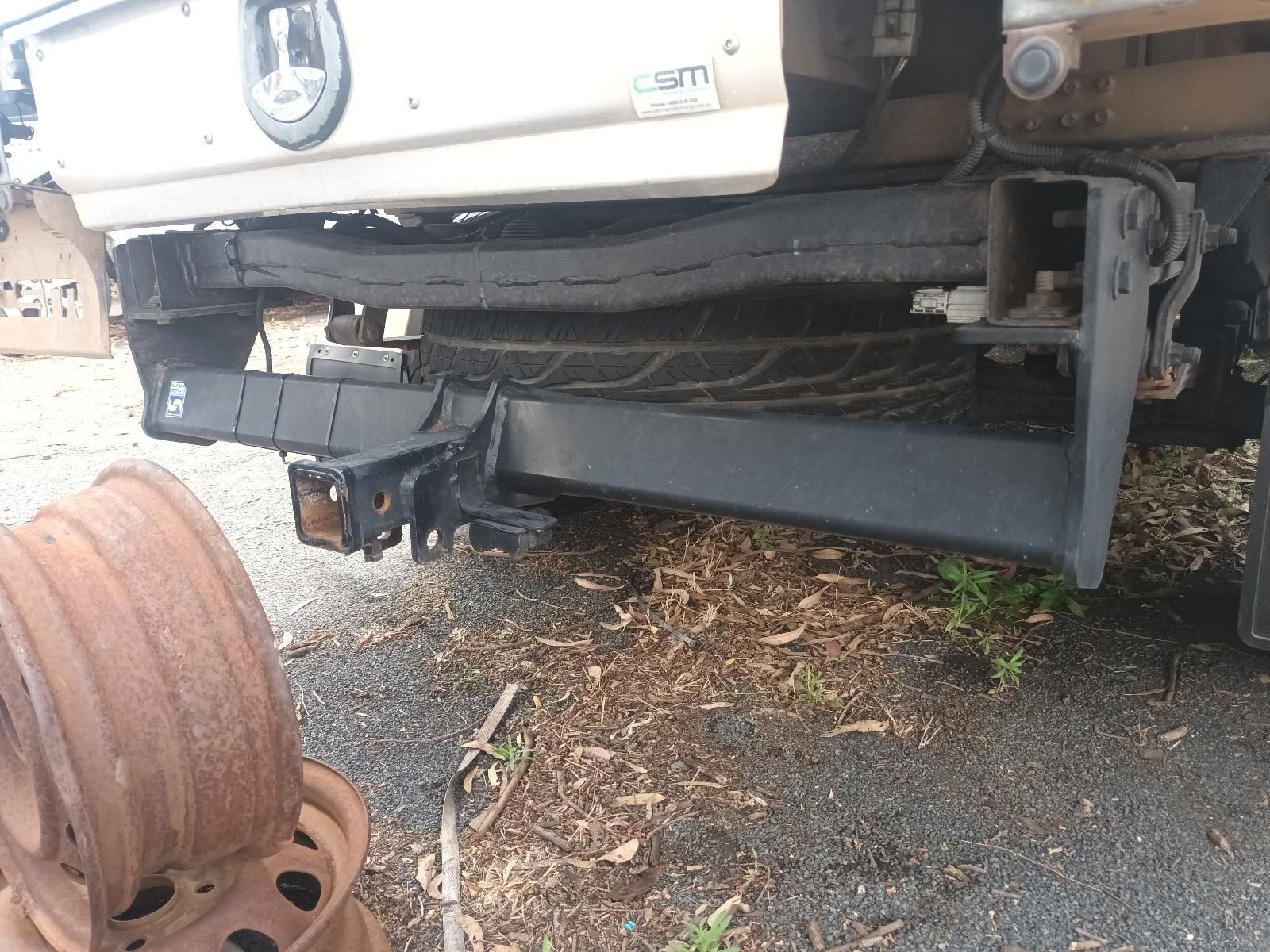 Rear Underside of A White Truck with Exposed Frame and Suspension — South West 4WD Wreckers In Harristown, QLD