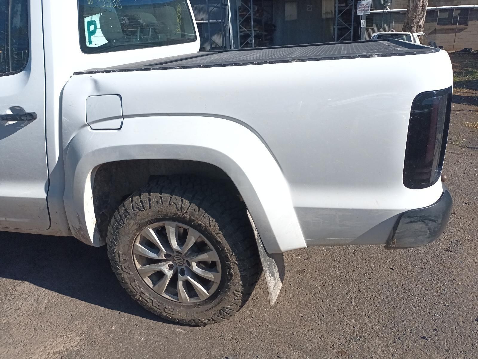 Silver Pickup Truck Rear Side Parked on A Dirt Road — South West 4WD Wreckers In Harristown, QLD