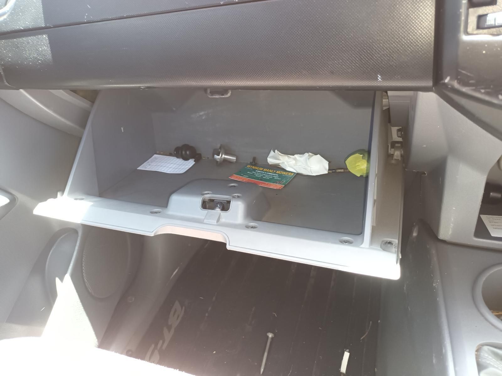 Open Glove Compartment with Crumpled Tissues — South West 4WD Wreckers In Harristown, QLD