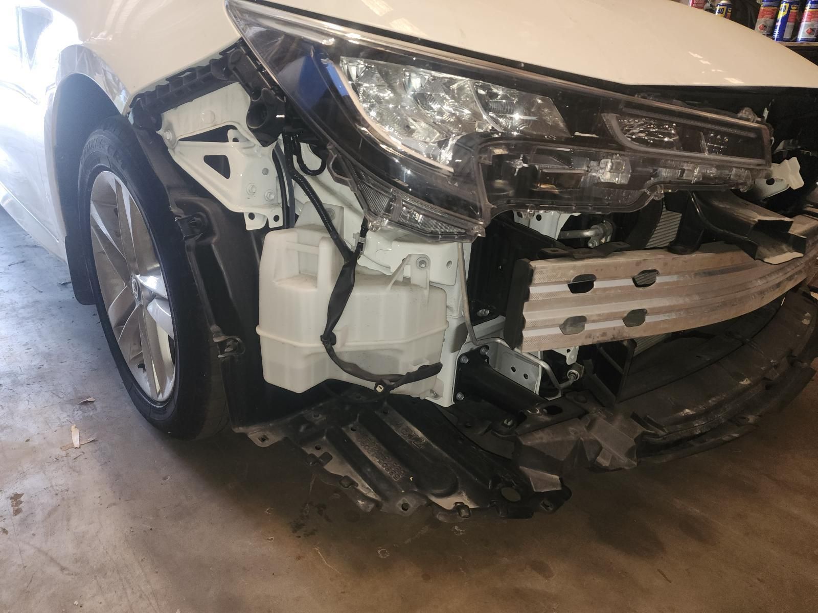 White Car With Severe Front-end Damage — South West 4WD Wreckers In Harristown, QLD