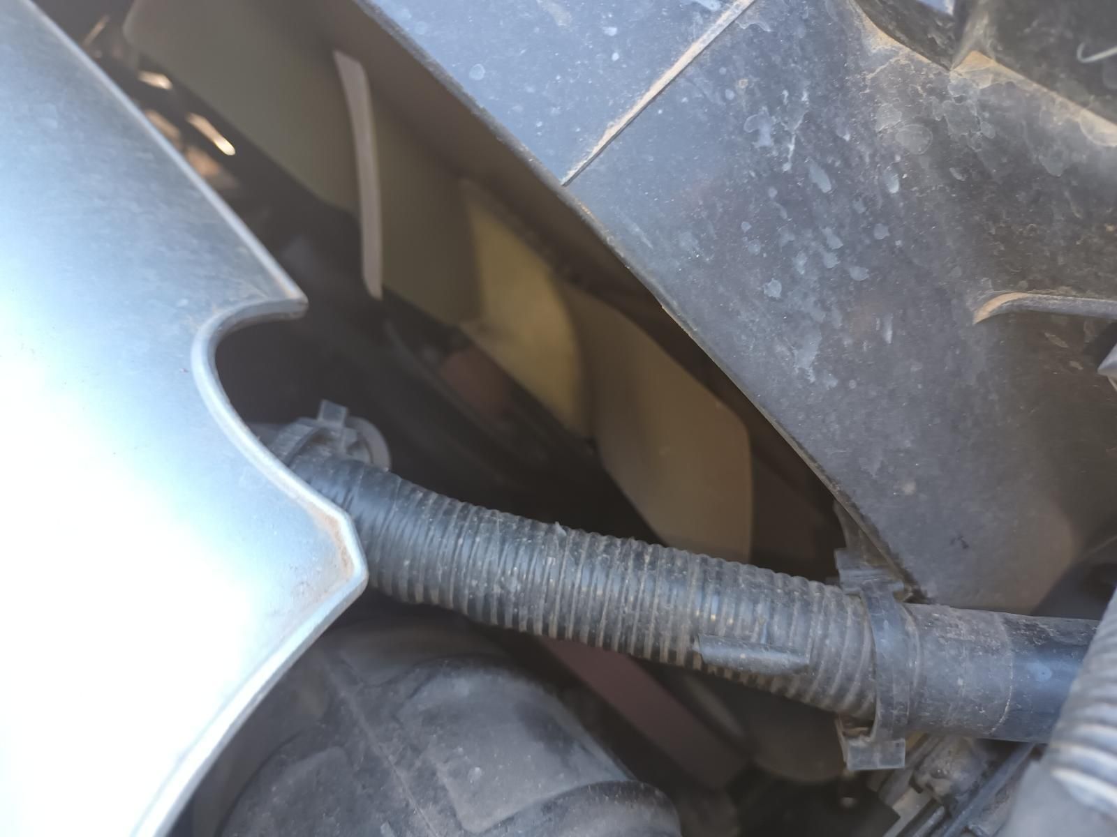 Close-Up of A Car Engine Compartment with A Black Corrugated Hose — South West 4WD Wreckers In Harristown, QLD