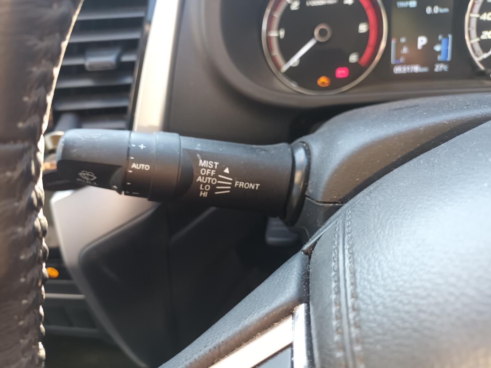 Car Dashboard Close-Up Showing the Steering Wheel and Headlight Control Stalk — South West 4WD Wreckers In Harristown, QLD