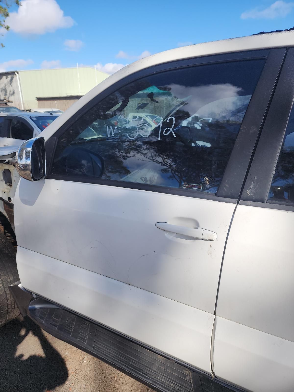 White SUV Parked Outdoors — South West 4WD Wreckers In Harristown, QLD