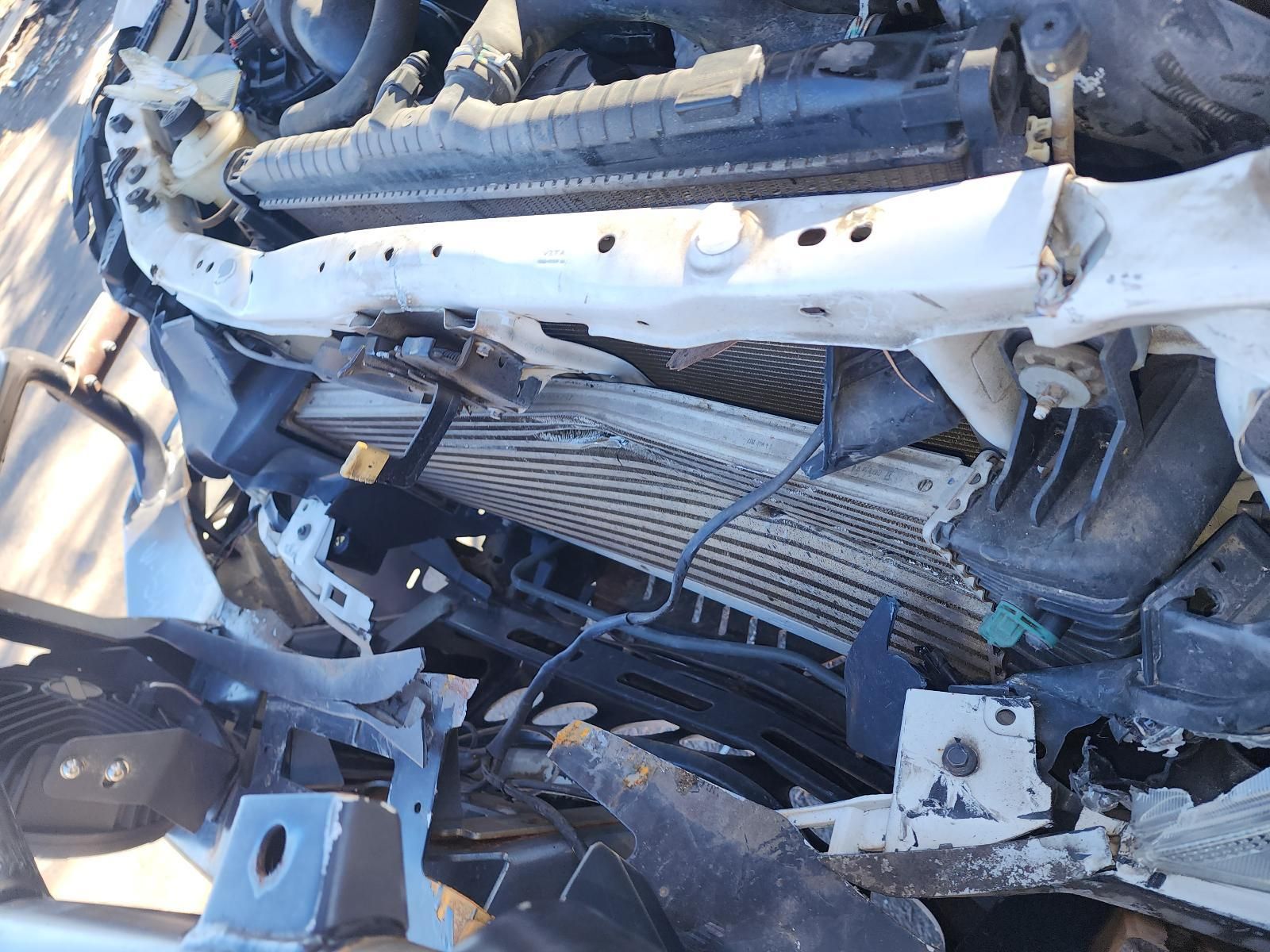 Severely Mangled White Car Front End — South West 4WD Wreckers In Harristown, QLD