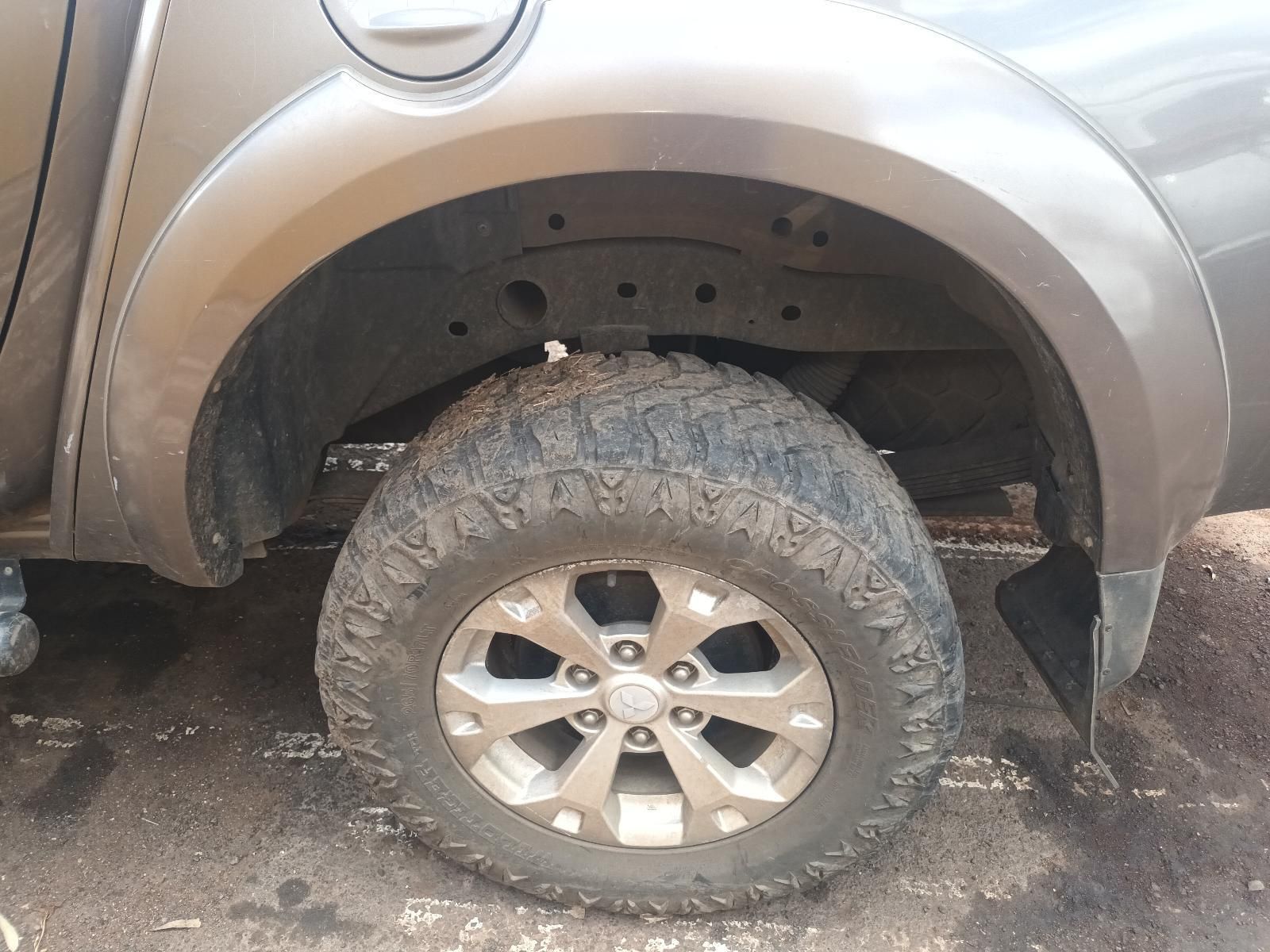 Close-Up of A Brown Suv’s Rear Wheel and Fender — South West 4WD Wreckers In Harristown, QLD