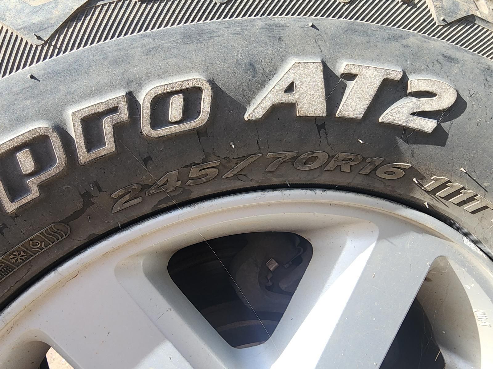 Close-up of a Rugged Tire and White Alloy Wheel on a Vehicle — South West 4WD Wreckers In Harristown, QLD
