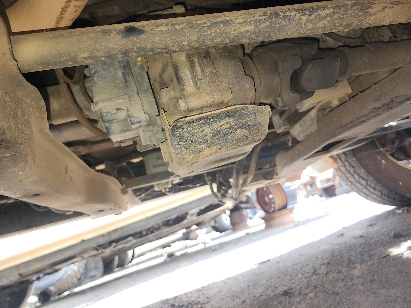 Undercarriage of a Vehicle Lifted on a Mechanic’s Lift — South West 4WD Wreckers In Harristown, QLD